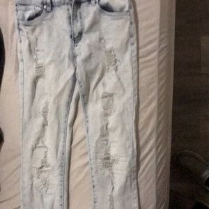 Like blue and white ripped skinny jeans